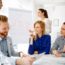 Happy business people brainstorming in office